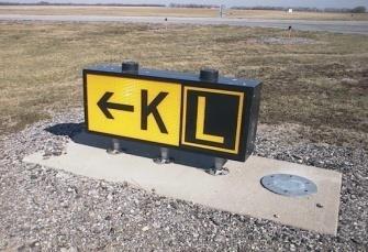 Direction Signs Direction signs have a yellow background with a
