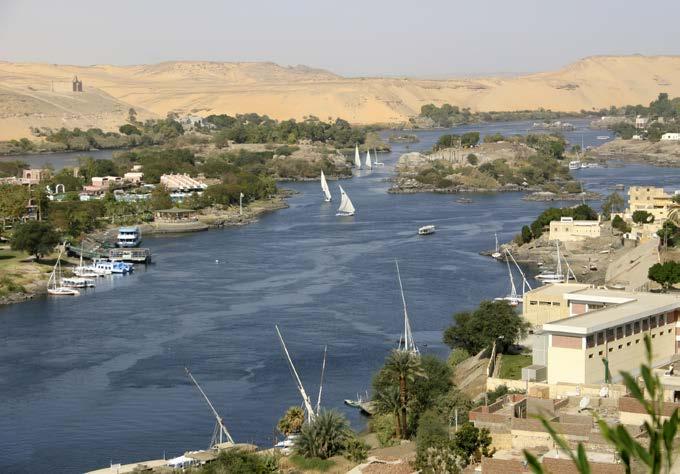 These hallways end in several different rooms, some of which are burial chambers. The Nile runs through most of s cities and towns, including Aswan, shown here.