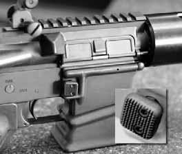 00 Spring loaded auto eject, simply press the mag release. Bolt carrier must be in the open position to insert.