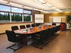 MEETING ROOMS MM Boardroom This room with a view, features large windows, oval conference table, comfortable padded chairs, a whiteboard,