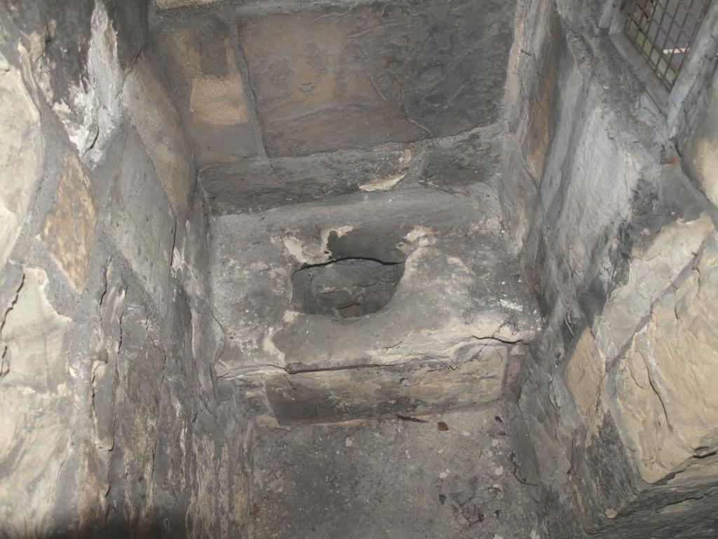 Perhaps they were something to do with a gallery? This floor has a projecting Garderobe or medieval toilet near the northwest angle, carried on corbels and entered by a short passage.