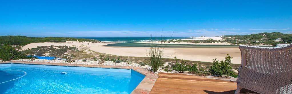 Five-star grading by the Tourism Grading View from the Oyster Box Beach House pool, overlooking the river mouth Luxury Seaside Holiday Accommodation The Oyster Box Beach House is our flagship luxury