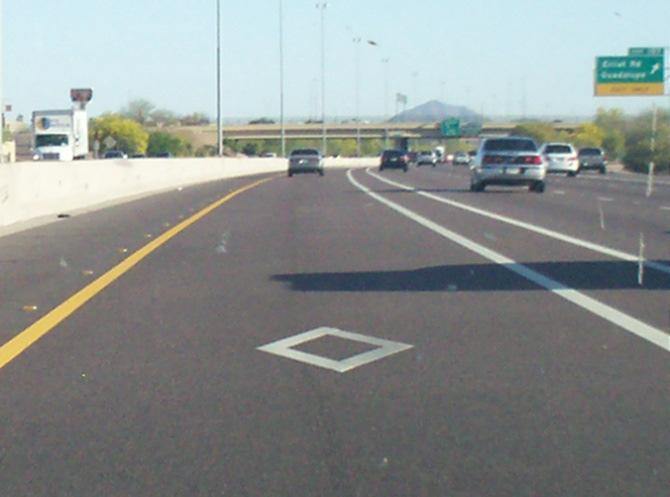maintain. An example of an overhead HOV lane sign is shown in Figure 2-15.