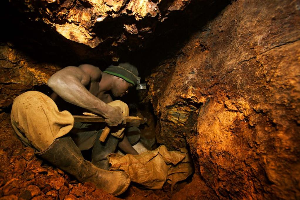 Miners at work in prohibitive conditions in the