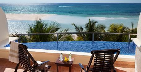 bed and oversized terrace just steps away from a relaxing swimming pool and the gorgeous Maroma Beach