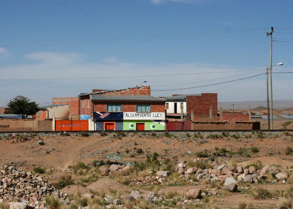 There s a long climb out of Copacabana; but a beautiful stretch of road leading around and through Lake Titicaca to the ferry crossing at San Pedro de Tiquina [009: cost 5 bolivianos each including