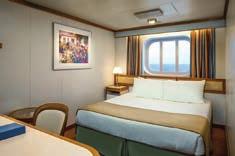com/suites MINI-SUITE WITH BALCONY All the fine amenities of a Balcony Stateroom plus: Luxury balcony furniture Balcony with 2 to 4 chairs, table and ottoman Bathroom tub and massage shower head
