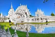of Thailand and Laos. Visit Wat Phra Dhat Jom Kitti by climbing 383 steps to the top of the hill. Also visit Wat Chedi Luang and a small museum nearby.