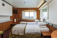 All these cabins are equipped with a flat-screen television, hairdryer and personal safe. Category 4: Premium Twin Inner Average size 140sq ft/12.