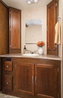 brings beauty and comfort to the sleeping area Cabinetry is available in spiced maple or