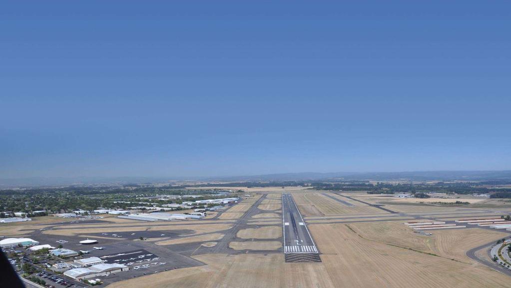 Runway Length Large Aircraft Current length available (6,600 ) does a good job of meeting the needs of the design aircraft most of the time. Under more extreme conditions (i.e. wet runways, very hot days) the design aircraft may be weight restricted.