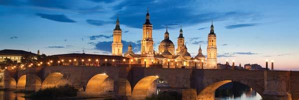 Essential Spain This multilingual tour of Spain is great value for money. Have the option of ending your Tour in Madrid or Barcelona, visiting the cities of Seville, Granada and Valencia.