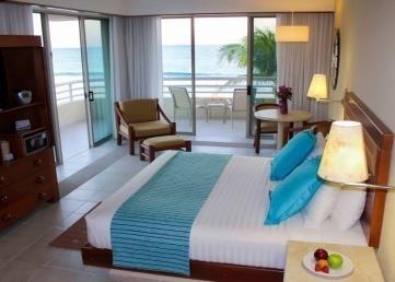Rooms Description Junior Suite Beach Front Club Premium Located exclusively in our corner ocean front building areas, featuring an L shape terrace where you can experience the view at the fullest.
