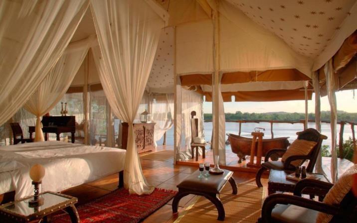 RUAHA RIVER LODGE Perfectly situated on one of the most stunning stretches of the Great Ruaha River you can see game throughout the day from the comfort of your veranda when you stay at Ruaha River