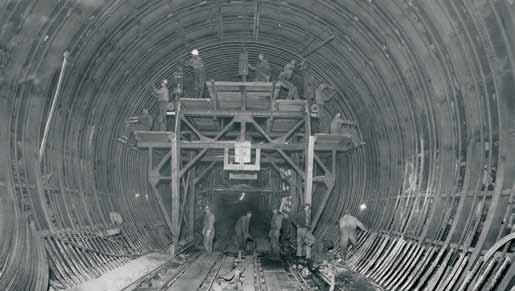 The tunnel intakes under construction in 1936. These intakes are now submerged under 200 feet of water at the bottom of Fort Peck Lake. Tunnel # 1 under construction in 1936.