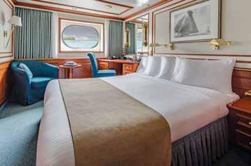 Orion s 53 outside cabins, including 9 suites with balconies, and 4 solo cabins, are traditional in style with rich