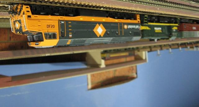 DL50 and T388 with a freight train slowly approach Deawy on the AMRA HO Stoney Creek layout.