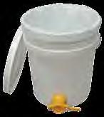 While you are extracting, the gate on the extractor should be kept open. The 5 gallon pail (18.92 l) with the filter inside would be placed under the gate to strain your honey as it enters the pail.