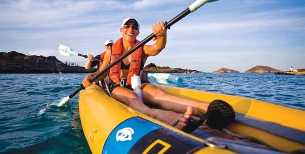 Guests enjoy kayaking off Santiago Island. North Seymour: Have up-close encounters with colonies of blue-footed boobies and magnificent frigate birds, and sea lion harems.