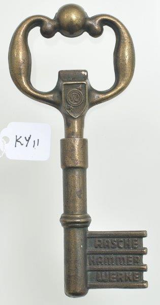 KY11 A bronze key advertising the Rasche