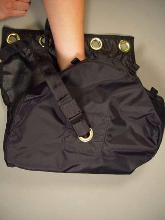 4. Pull the bridle through the main deployment bag grommet until the grommet is snug against