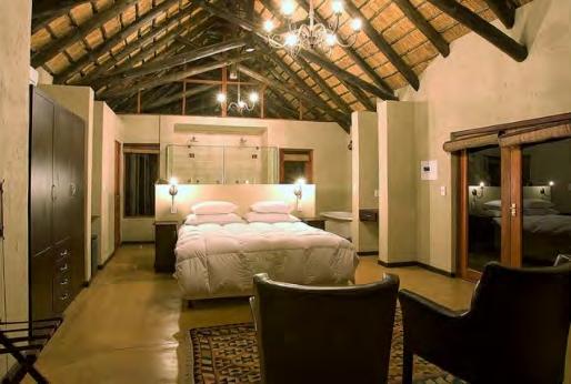Each lodge comprises a huge central open plan living area linked by paths and walkways leading to the 5 spacious bedroom suites (separate chalets), swimming pool, firepit boma, carports and an