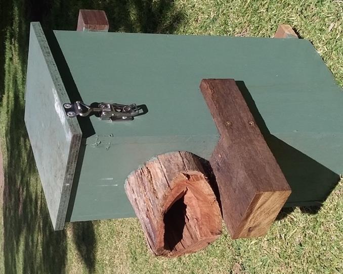24 OLD DESIGN Small hollow log to allow the sugar gliders to enter easily whilst larger predators and competitors cannot.