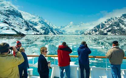 Admire Alaska s magnificent mountainous landscape, a backdrop to its stunning glacial blue-coloured waters.