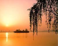 West Lake The famous West Lake is like a brilliant pearl embedded in the beautiful and fertile shores of the East China Sea near the mouth of the Hangzhou Bay.