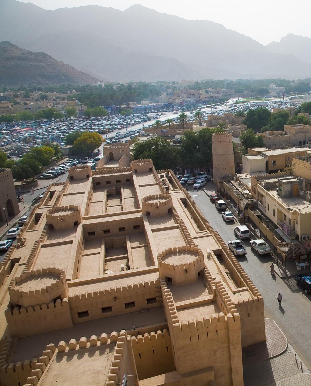 NIZWA: THE FORT AND SOUQ Rising from the lush greenery and dates palms fed by the longest falaj system in the country, Nizwa city is a great place to spend the morning.