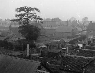 3. Exterior and graveyard photographed by Peter Chapman from scaffolding around the chimney of 8 Baker Street, mid 1950s.