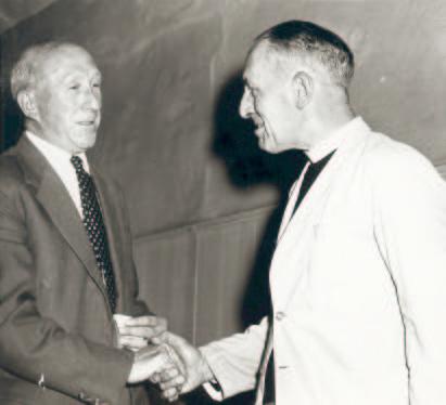 7. Reg Lawson (churchwarden) saying farewell to Rector Cooper in 1962 (77O), an interesting picture