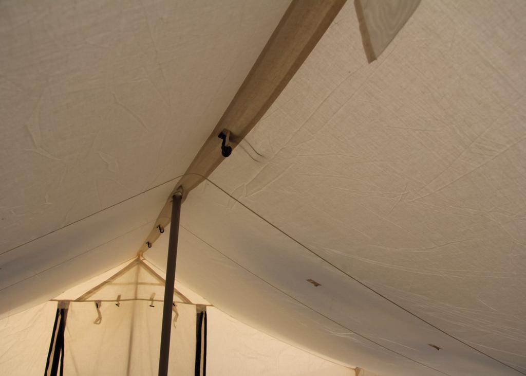 The doors are made of the same material as the tent and closed with polyester n 10 coil zipper fasteners at the 2 vertical sides.