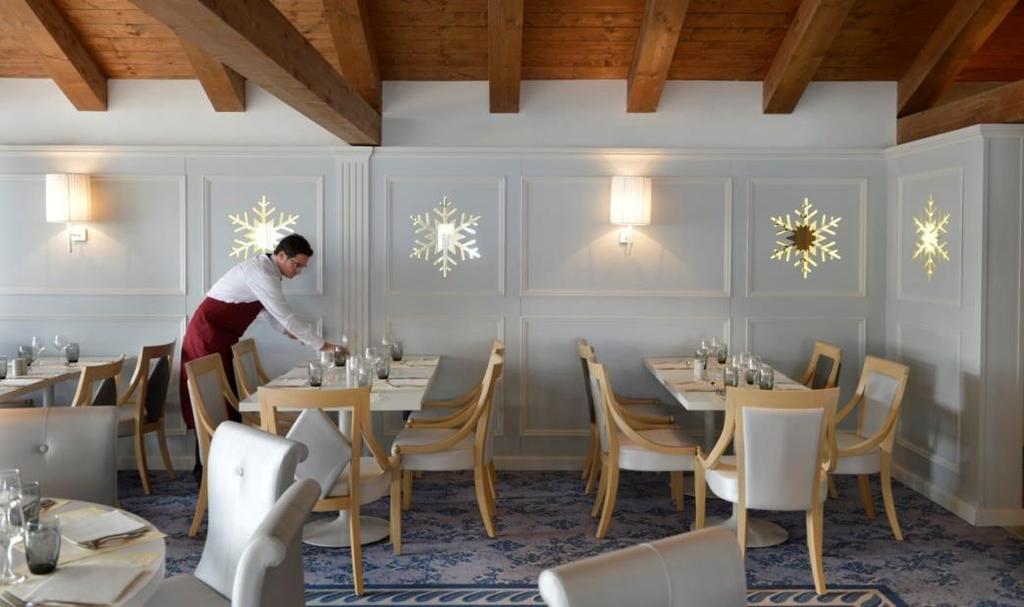 With traditional Italian mountain cuisine, tasteful décor and stunning views of the mountains,