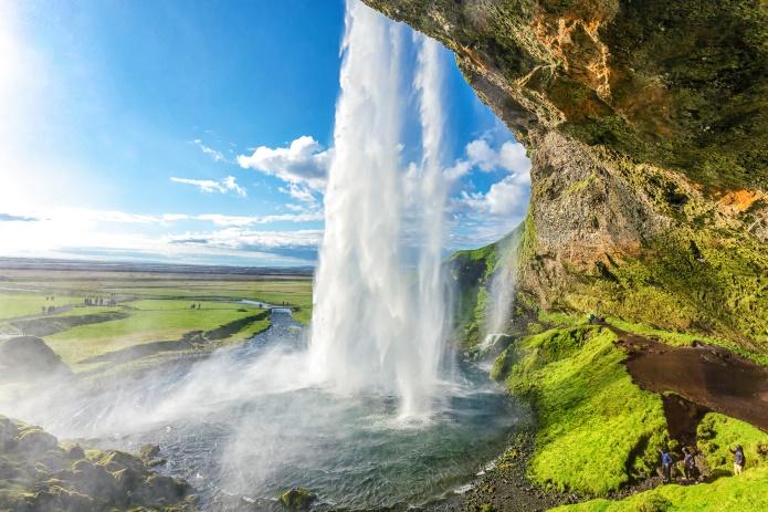 You will then have an opportunity to stand behind Seljalandsfoss, a plummeting waterfall. Next up is Skógafoss, a picture perfect waterfall located at Skógar.