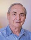 Asher Aud was born in 1928 in Zdunska Wola, Poland as Anshel Sieradzki, to Shmuel Hirsh Sieradzki, a tailor, and his wife Jocheved. Asher had an older brother, Berl, and a younger brother, Gabriel.