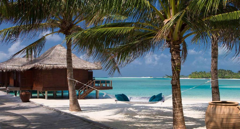 Deluxe Over Water Bungalow Create true Maldivian memories in a stunning over water bungalow. Bathe in the sunlight on your expansive two-tiered deck before retreating to the cool bedroom.
