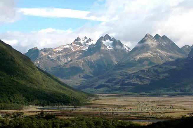 Transfer to the domestic airport for a domestic flight to Ushuaia, the capital of the Argentine province of Tierra del Fuego which divides the mountains, glaciers and forests of the island to the