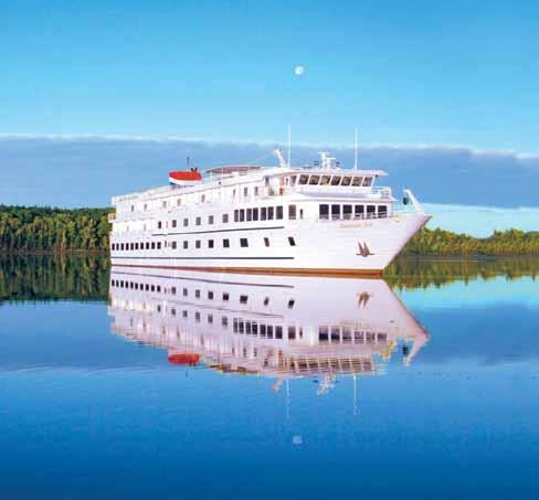 Each of the spacious staterooms is outside-facing and features a king or two twin beds, en suite bathroom with shower, writing table, dresser and closet, and a large picture window that can be opened.