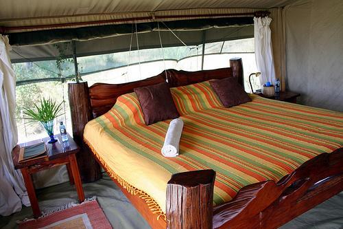 The spacious tents are all furnished with large, hand made cedar beds, 24 hour solar lighting and the finest linen.