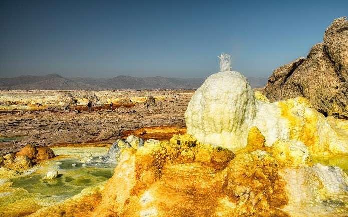 ETHIOPIA DALLOL Dallol, which is better known as Dallol Volcano and also as Dallol Hydrothermal Fields, is a volcanic explosion crater which is located in the Danakil Depression, in the Federal