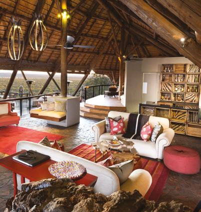 Gather at the main thatched dining area and enjoy a drink at the bar while watching wildlife congregate and interact at the floodlit waterhole.