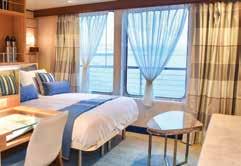 CATEGORY 3: Upper Deck #201-206 Cabins feature two lower single beds that can convert to a Queen, a writing desk, and two large view windows.