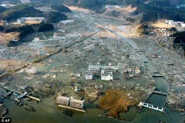 2 of 15 03/12/2011 07:44 Evening Catastrophe: The true scale of the devastation that the tsunami unleashed is clear in this picture of the port city of Minamisanriku town where 10,000 people are
