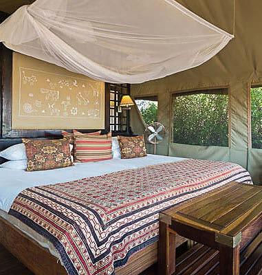 Eight stylish, well-insulated ensuite tents with shaded outdoor lounges are laid out against a rugged backdrop of hills and overlook a broad valley at the confluence of two tributaries, providing