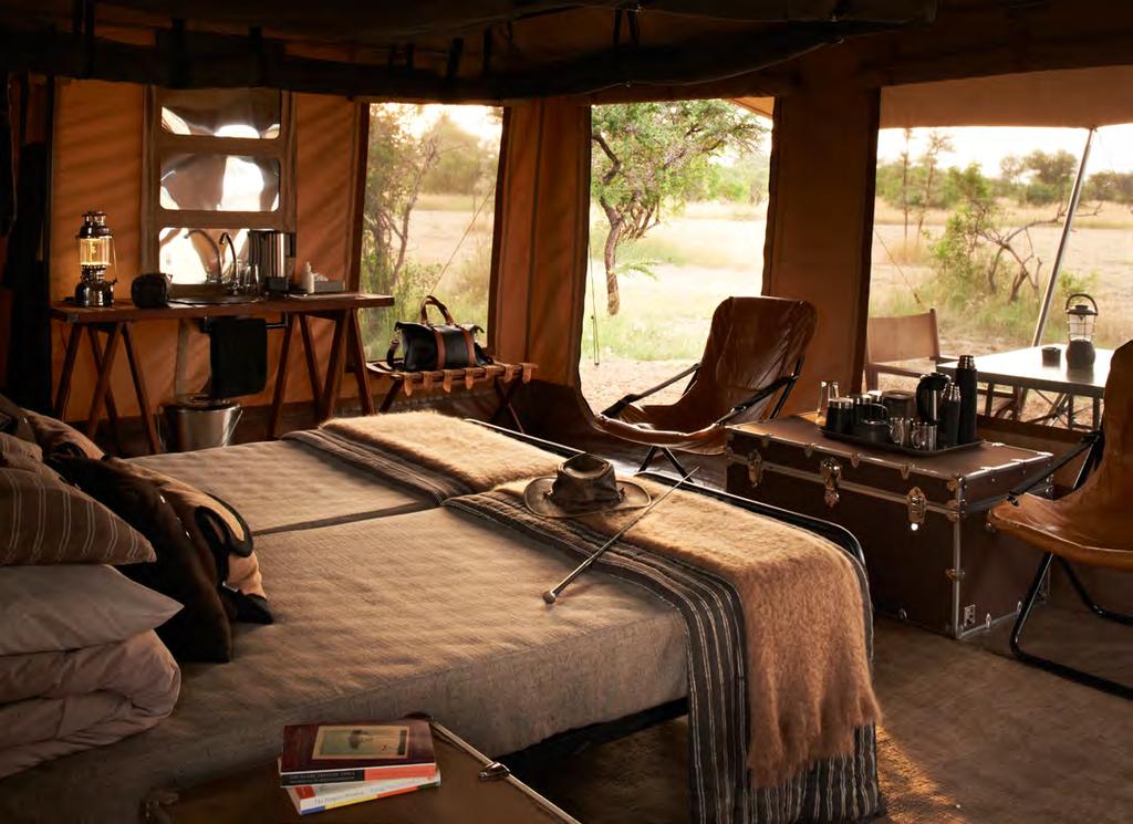 Rugged comfort Return from game drives to en-suite hideaways, where tented