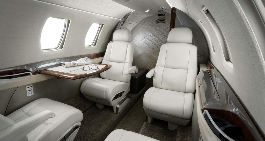 The interior layout provides seating for up to seven passengers to work and relax comfortably.