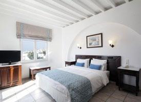 Yiannaki Hotel Situated on a small hill overlooking the bay of Ornos, this family run hotel is newly refurbished with excellent facilities complementing the ever-excellent service.