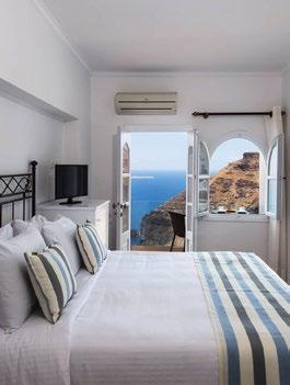 Aegean Plaza Hotel Located in the magnificent Kamari area, 50m the black sandy beach.