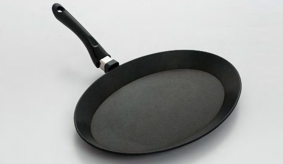 This frypan has a Bakelite handle and a generous cooking area of 15.75" x 11".